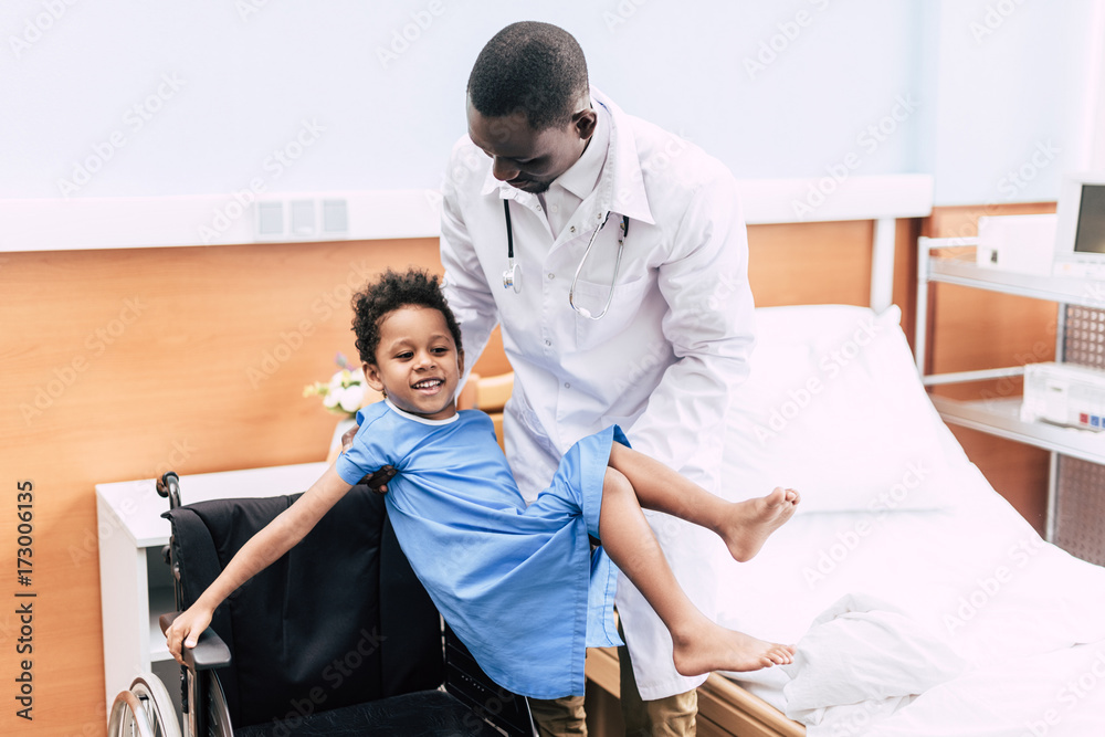 african american doctor and disabled patient