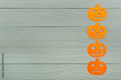 Paper silhouette of four different pumpkin right vertically