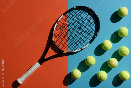 tennis racket and balls