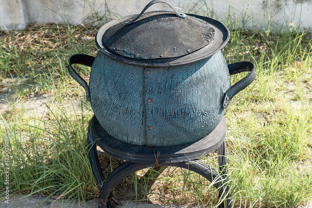 Antique trash placed outside for the trash. Antique trash placed outside for the trash.