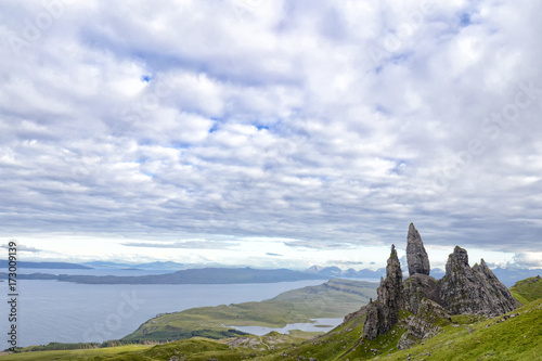 Wide angle view of the Old Man of Storr and the Sound of Raasay on the Isle of Skye in Scotland.