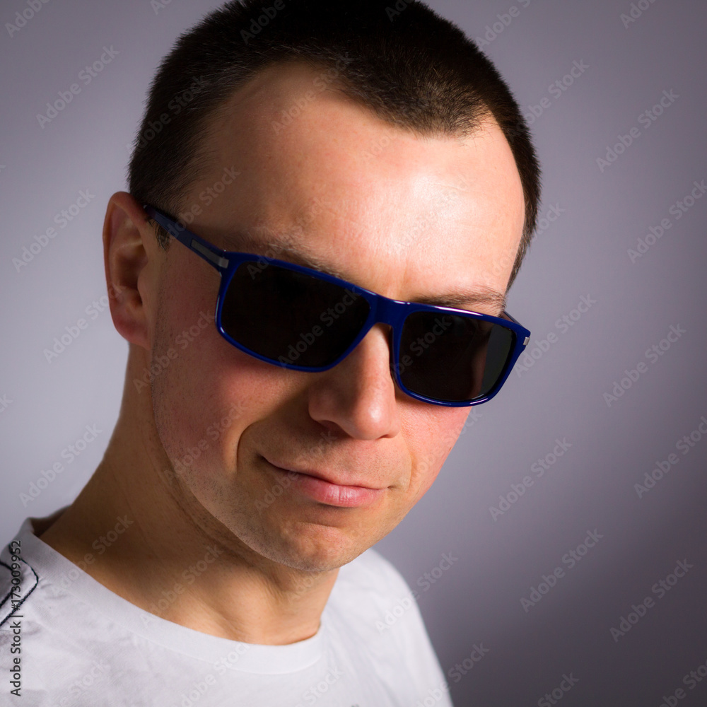 Classic Portrait of sympathetic men in middle-aged, with sunglasses.