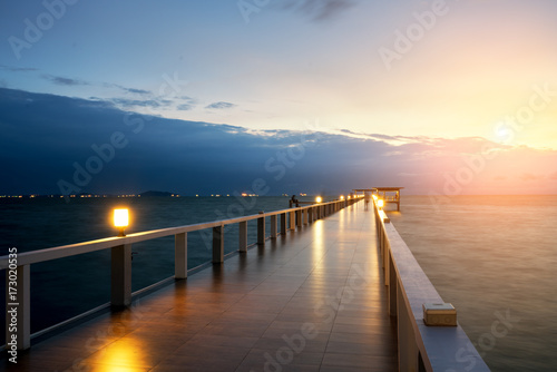 Wooden pier between sunset in Phuket, Thailand. Summer, Travel, Vacation and Holiday concept.