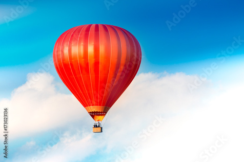 Red air balloon in the sky.