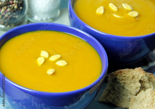 Warm tasty autumn creamy pumpkin soup