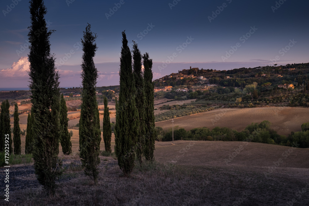 Fototapeta premium Casale Marittimo, Tuscany, Italy, view from the cypresses on september