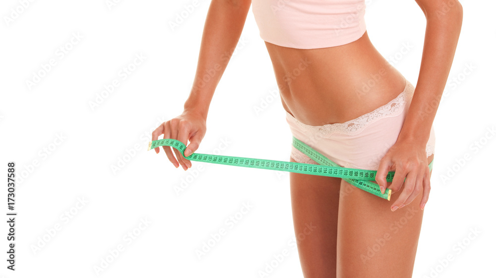 Premium Photo  Woman measuring thigh with yellow measuring tape. body  check. diet fitness concept.