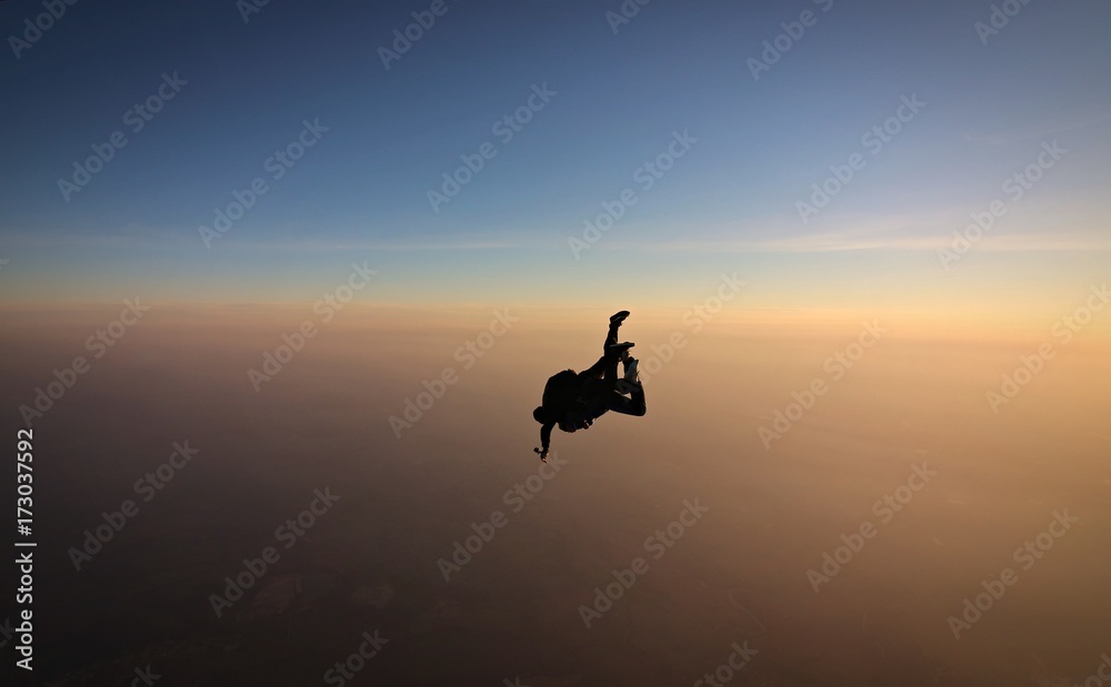 Skydiving tandem sunset with soft focus on the background