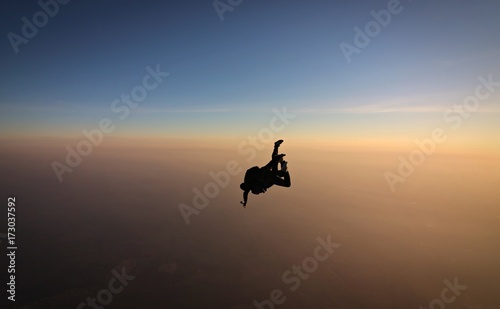 Skydiving tandem sunset with soft focus on the background