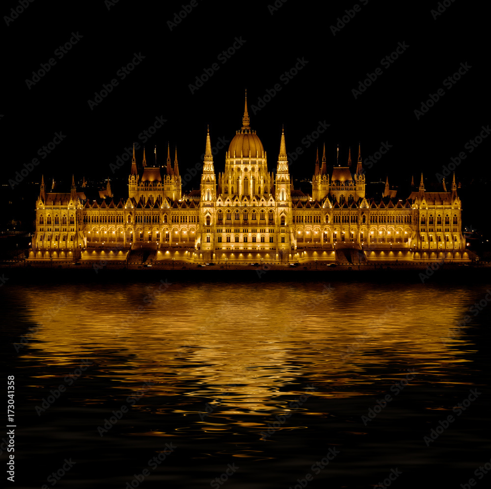 Fototapeta premium Budapest Parliament in Hungary at night on the Danube river