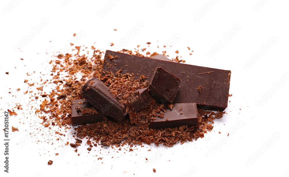 Pile chopped, milled chocolate with shavings isolated on white Pile chopped, milled chocolate with shavings isolated on white