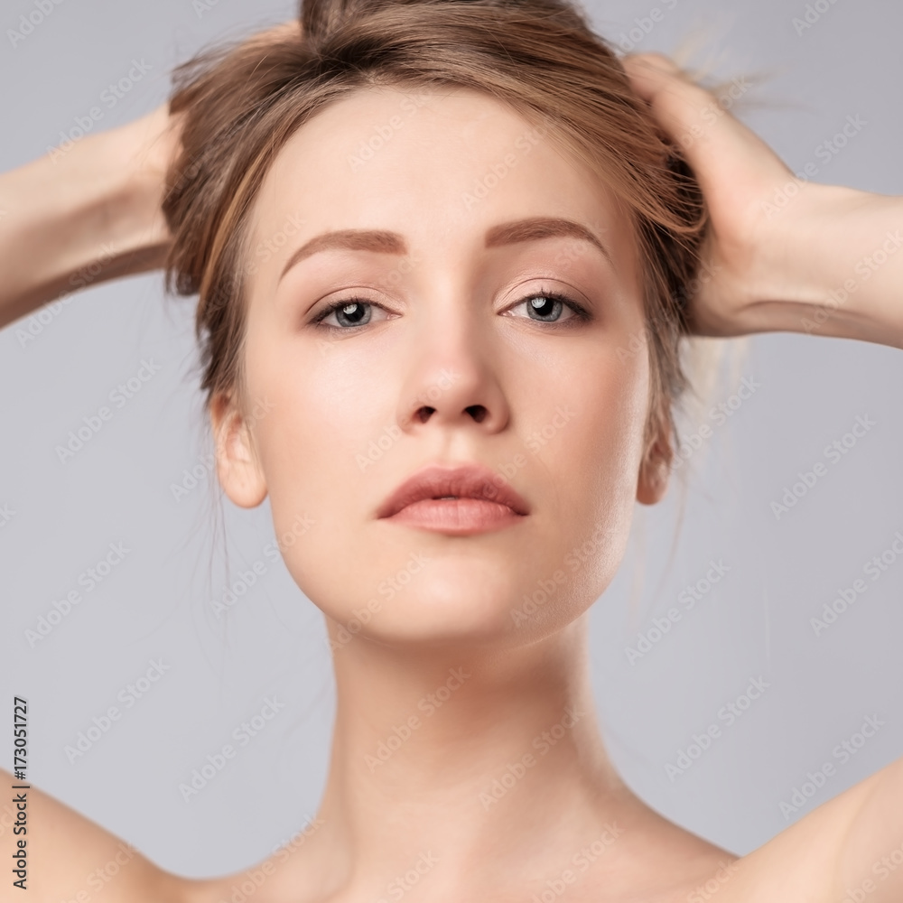 Naklejka premium Portrait of young caucasian woman with perfect skin clean