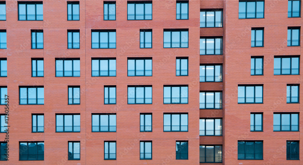 Architectural Exterior Detail of Residential Apartment Building with Brick Facade