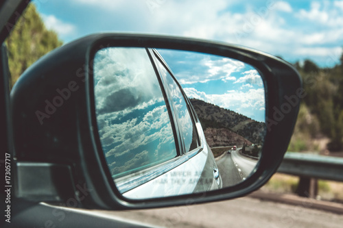 Side mirror of the car. View from the window © konoplizkaya