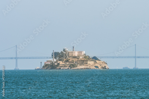 alcatraz island views with san francisco bridge at background