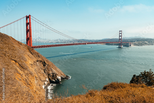 panoramic view of golden gate bridge with san francisco at background