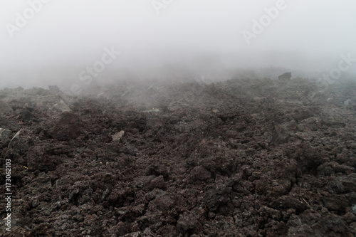 Lava flow of the Pacaya volcano in the mist, Guatemala