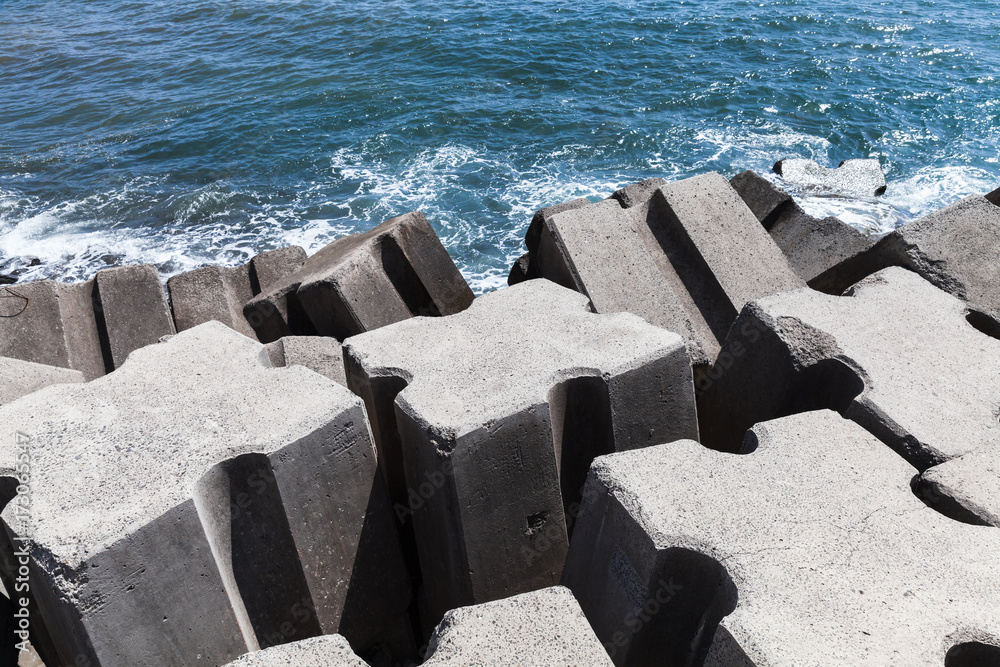Rough concrete blocks as a part of breakwater Stock Photo | Adobe Stock