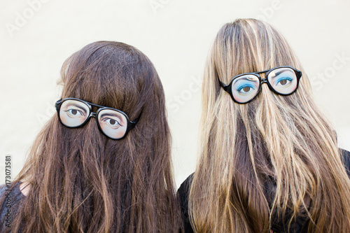 Long hair and crazy eyed glasses