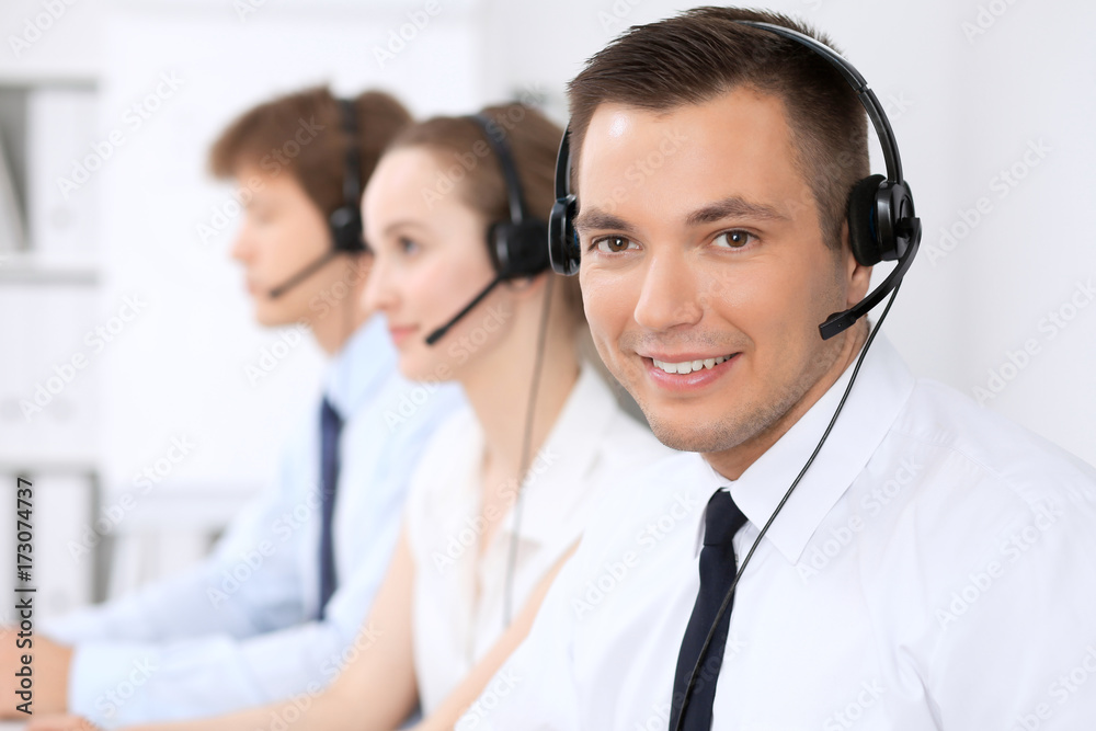 Young business man in headset. Call center Young business man in headset. Call center