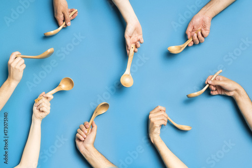 Composition with hands and spoon