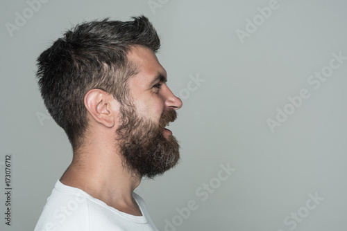 man with long beard on happy face