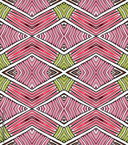 Seamless striped vector pattern. Vintage colored decorative repainting background with tribal and ethnic motifs. Abstract geometric roughly hatched shapes colored with hand drawn brush stokes.