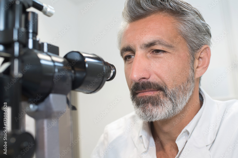handsome mature scientist working