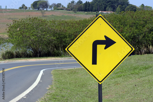 Signpost of sharp curve on road of Sao Paulo, Brazil