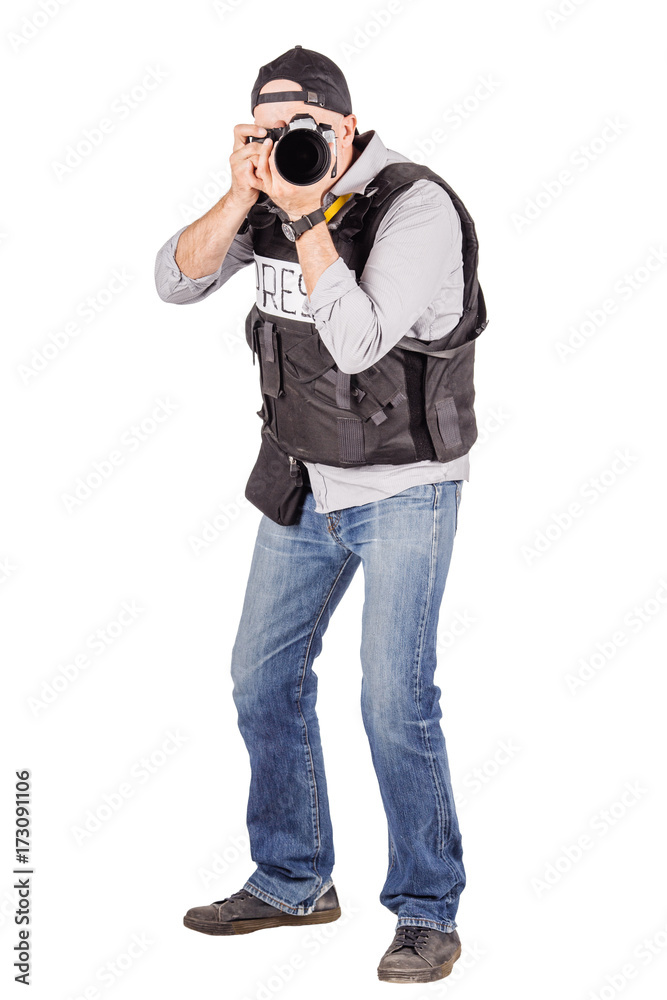 military press photographer with a professional camera. military press photographer with a professional camera.