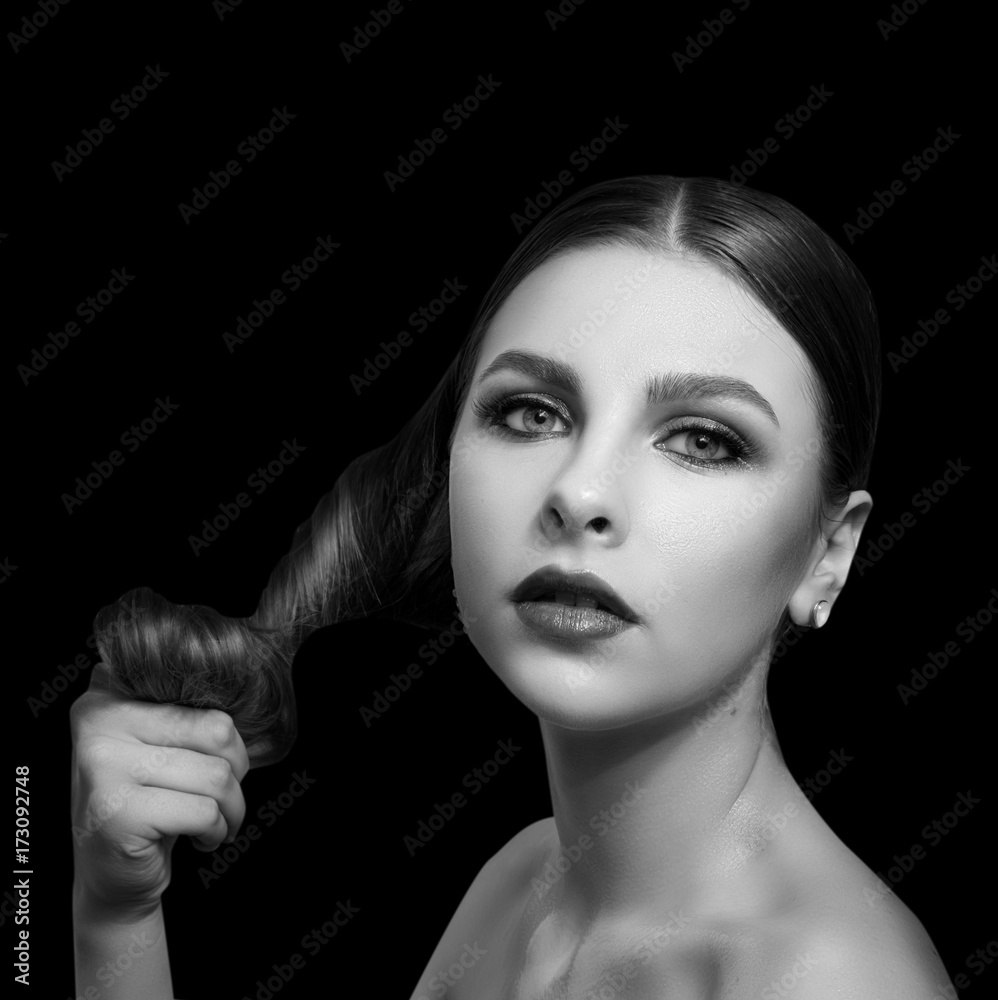 Fototapeta premium Fashionable portrait of a girl model. Fashion, accessories, evening wet effect makeup. 