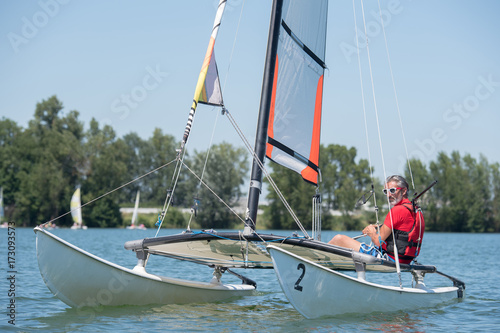 man sailing on lake