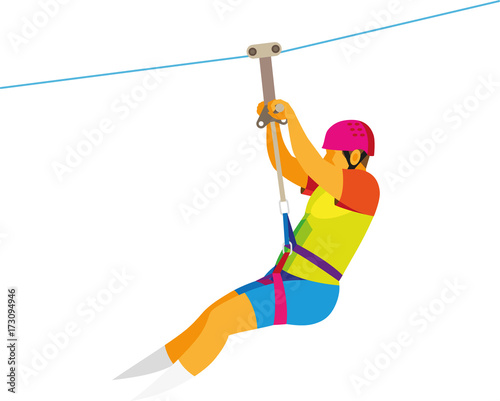 An adult man descends on a cable at an attraction zipline
