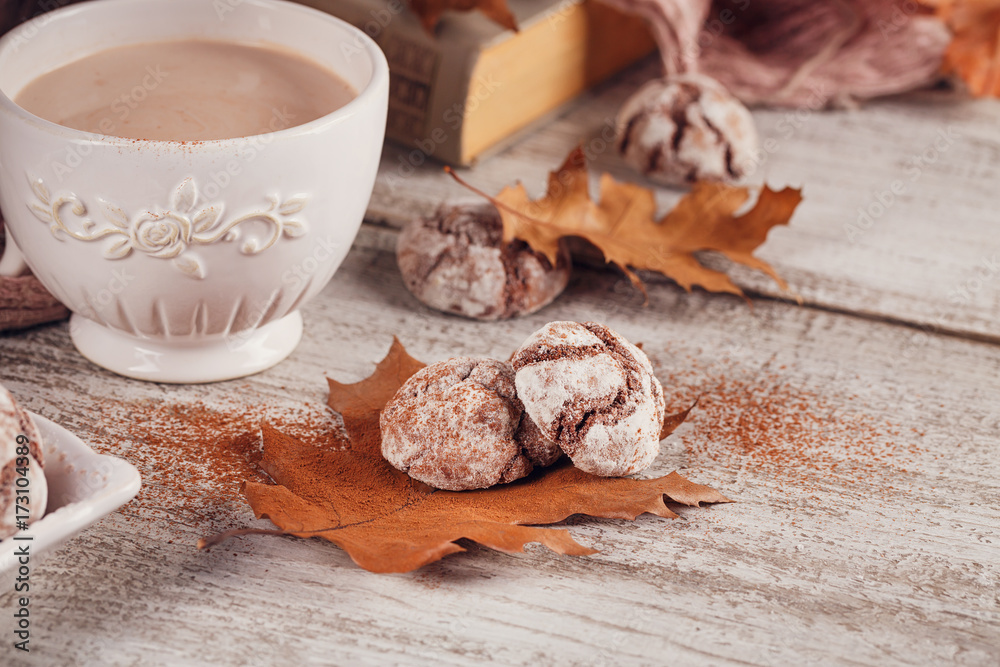 Autumn still life with cup of cocoa and chocolate cookies