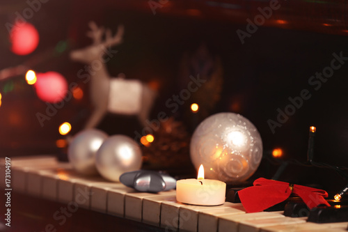 Wall Mural New year decorations on piano keyboard. Christmas music concept