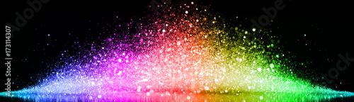 Rainbow of sparkling glittering lights abstract background