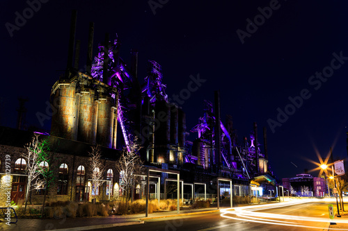 Steel stacks with purple and yellow lighting as entertainment area in downtown Bethlehem Pa.