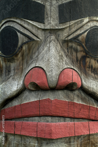 Alaskan Totem Pole Closeup. A detail view of an Alaskan Totem pole in southeast Alaska. photo