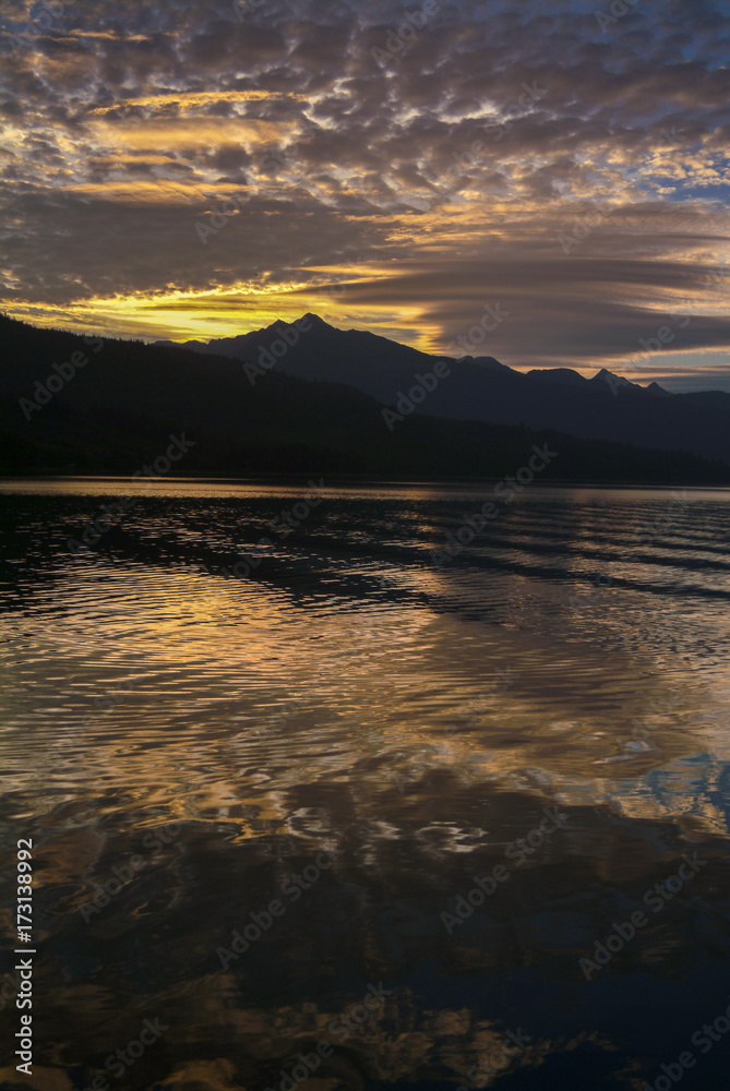 Beautiful Sunset in Southeast Alaska. A gorgeous sunset while traveling through the inside passage and the thousands of islands between Sitka and Wrangell, Alaska. 