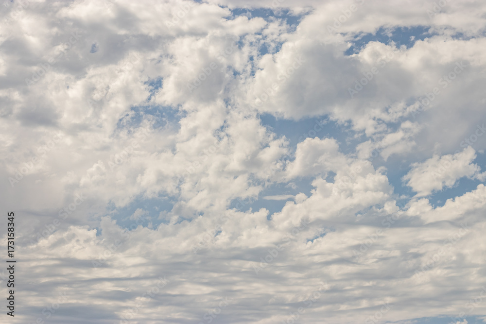 Obraz premium blanket of puffy white clouds