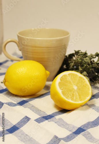 Lemons and peppermint with tea cup