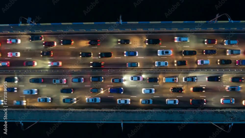 Aerial timelapse of freeway traffic city rush hour. Heavy traffic jam. UHD, 4K