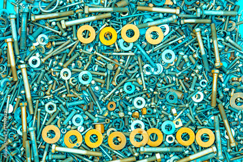 Abstract grunge metallic background from bolts  screws  nuts