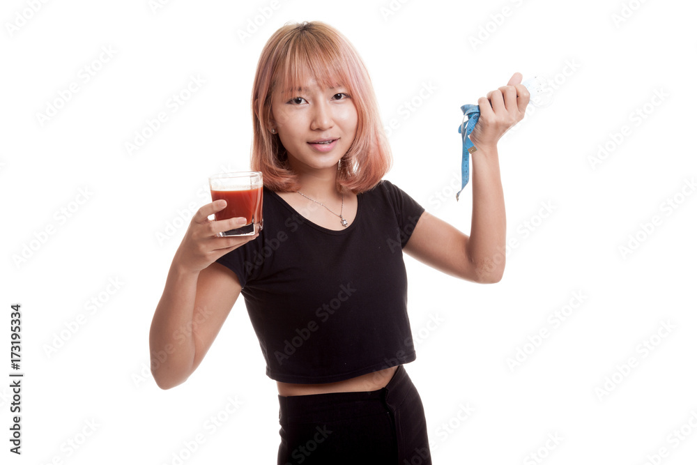 Asian woman with tomato juice and measuring tape. Asian woman with tomato juice and measuring tape.