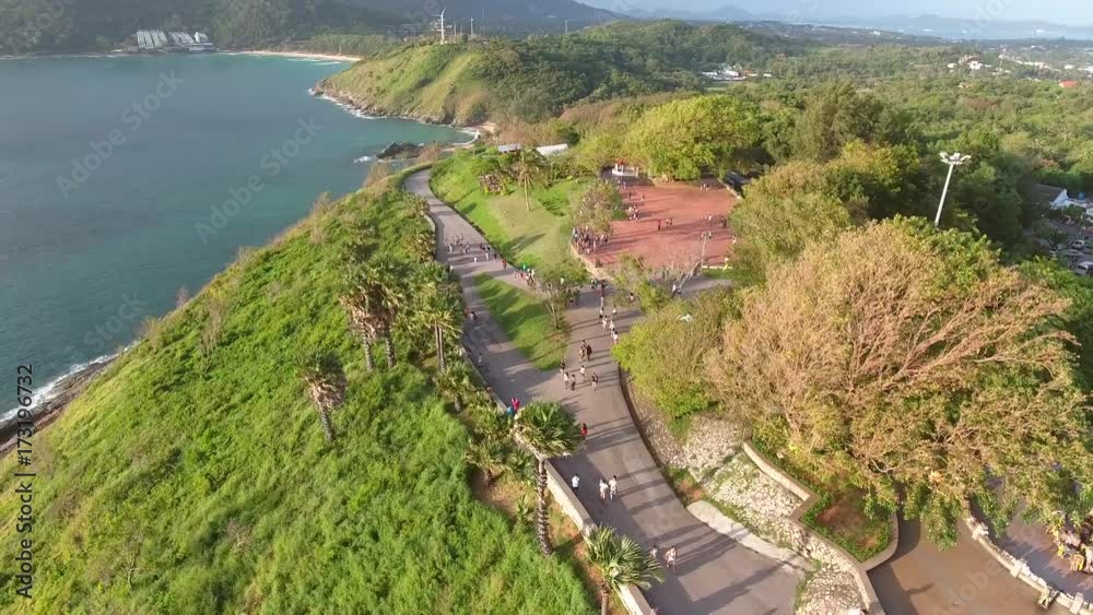 Promthep Cape. Popular Touristic Sunset Viewpoint at Phuket Island, Thailand. Aerial view in 4K. Promthep Cape. Popular Touristic Sunset Viewpoint at Phuket Island, Thailand. Aerial view in 4K.