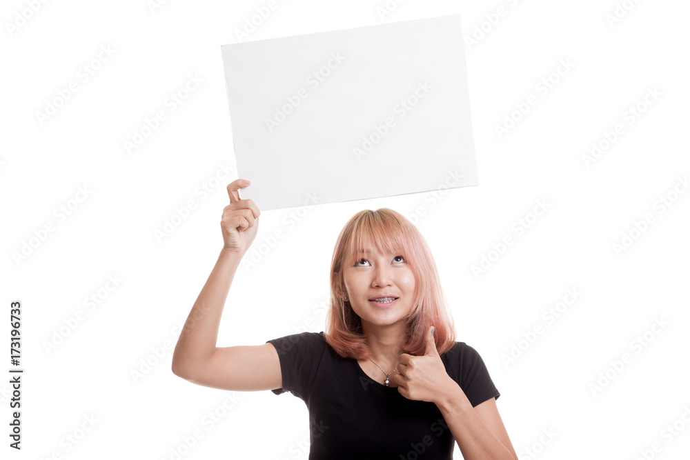Young Asian woman show thumbs up with white blank sign. Young Asian woman show thumbs up with white blank sign.