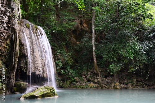 Scenic view of waterfall in the rainforest  cliff of waterfall  erawan waterfall national park kanchanaburi thailand. 