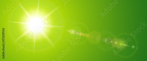 Sunny background, green sun with lens flare
