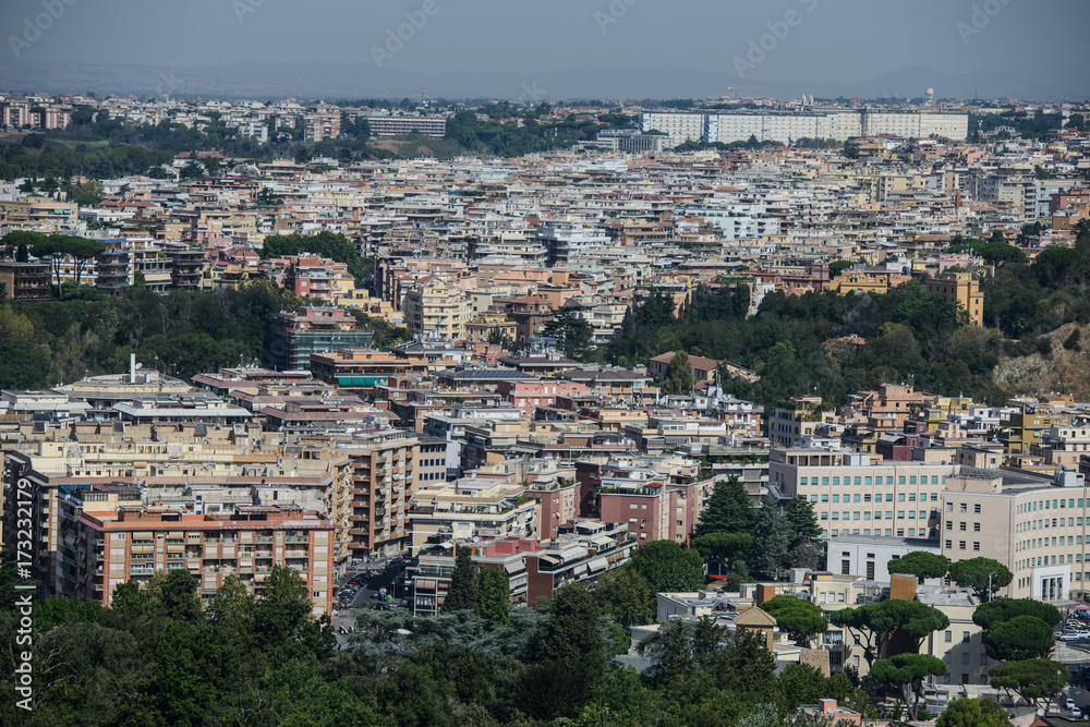 Background with town roofs, cityscape. Buildings of the city - urban background and town landscape. Houses and rooftops of a big city as texture. ROME