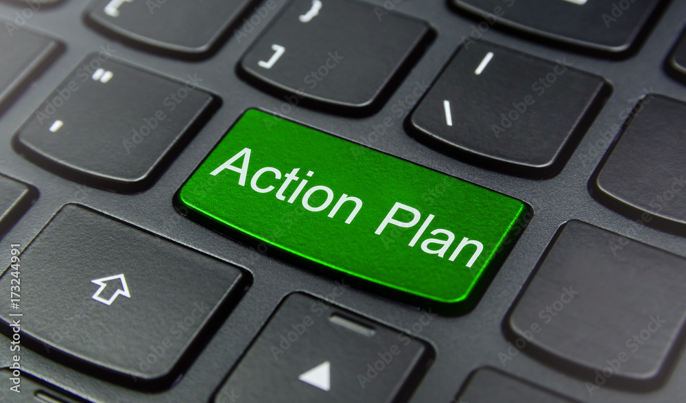 Close-up the Action Plan button on the keyboard and have Green color button isolate black keyboard Close-up the Action Plan button on the keyboard and have Green color button isolate black keyboard